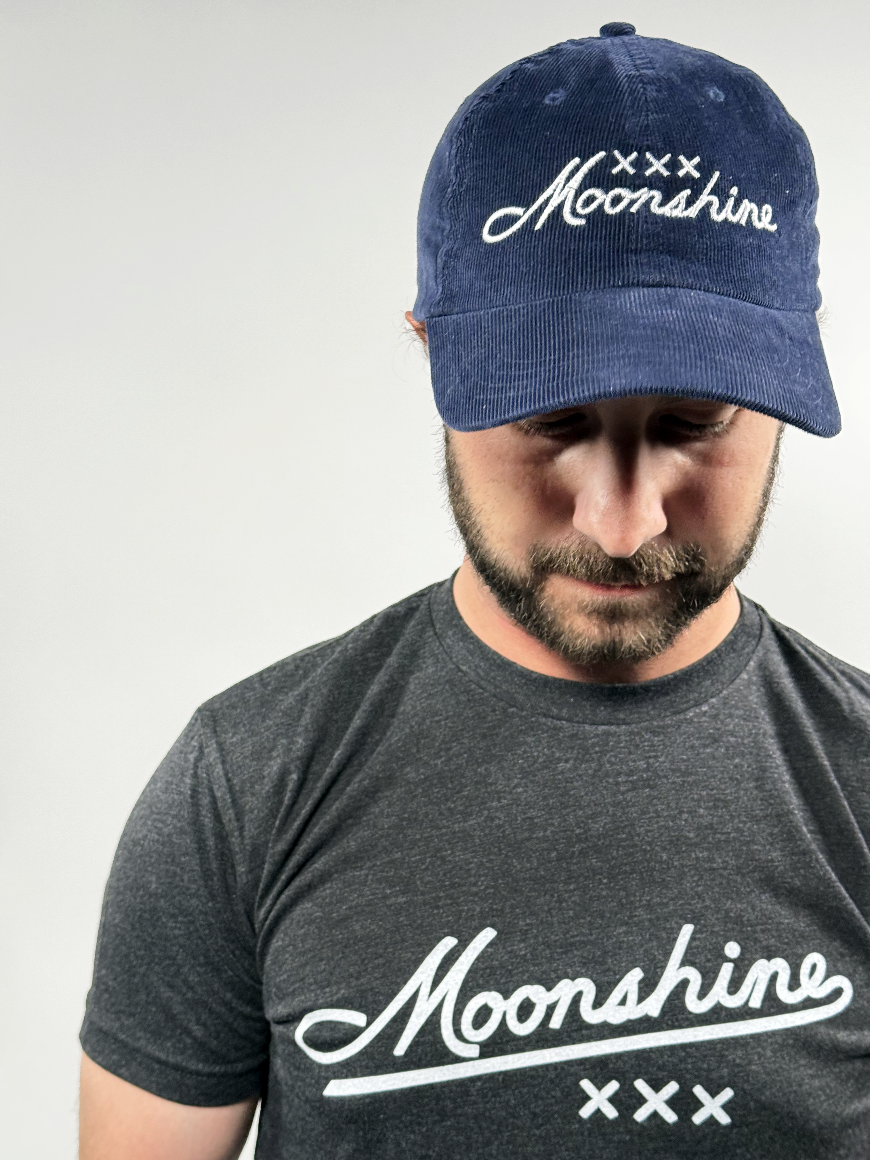 Male-Model-Wearing-Moonshine-Navy-Corduroy-Hat